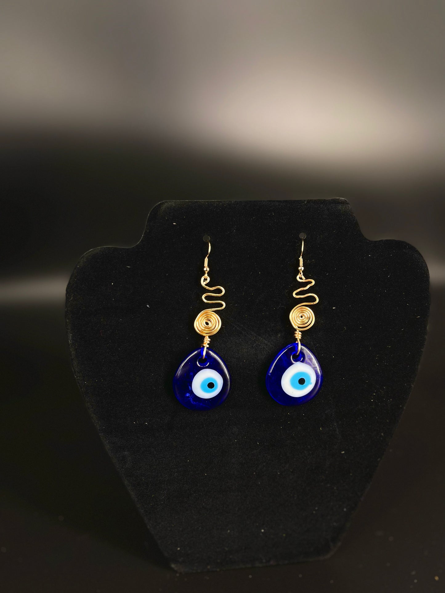 Pendientes de espiral de mal de ojo
