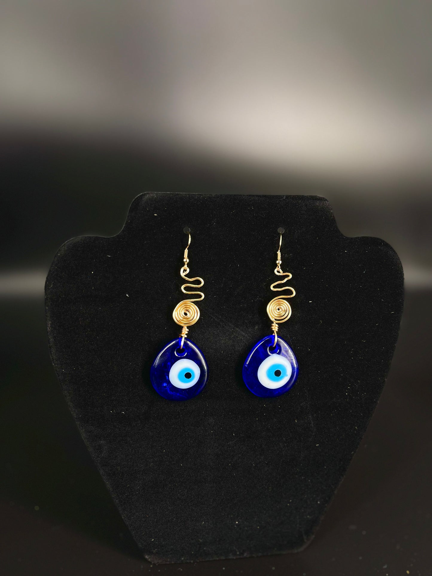 Pendientes de espiral de mal de ojo
