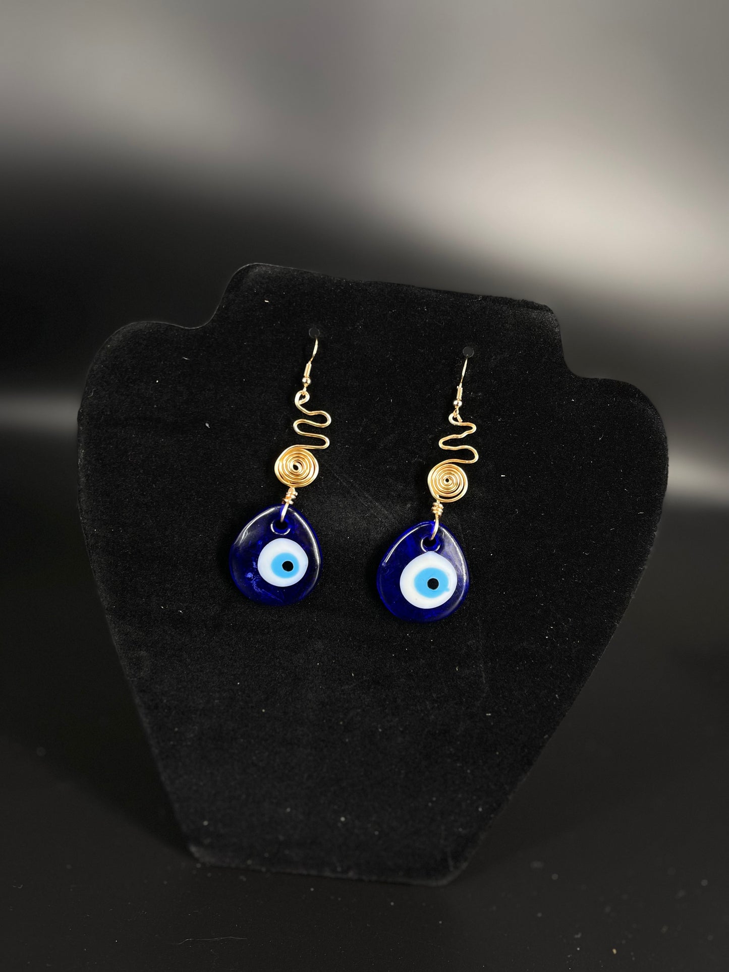 Pendientes de espiral de mal de ojo