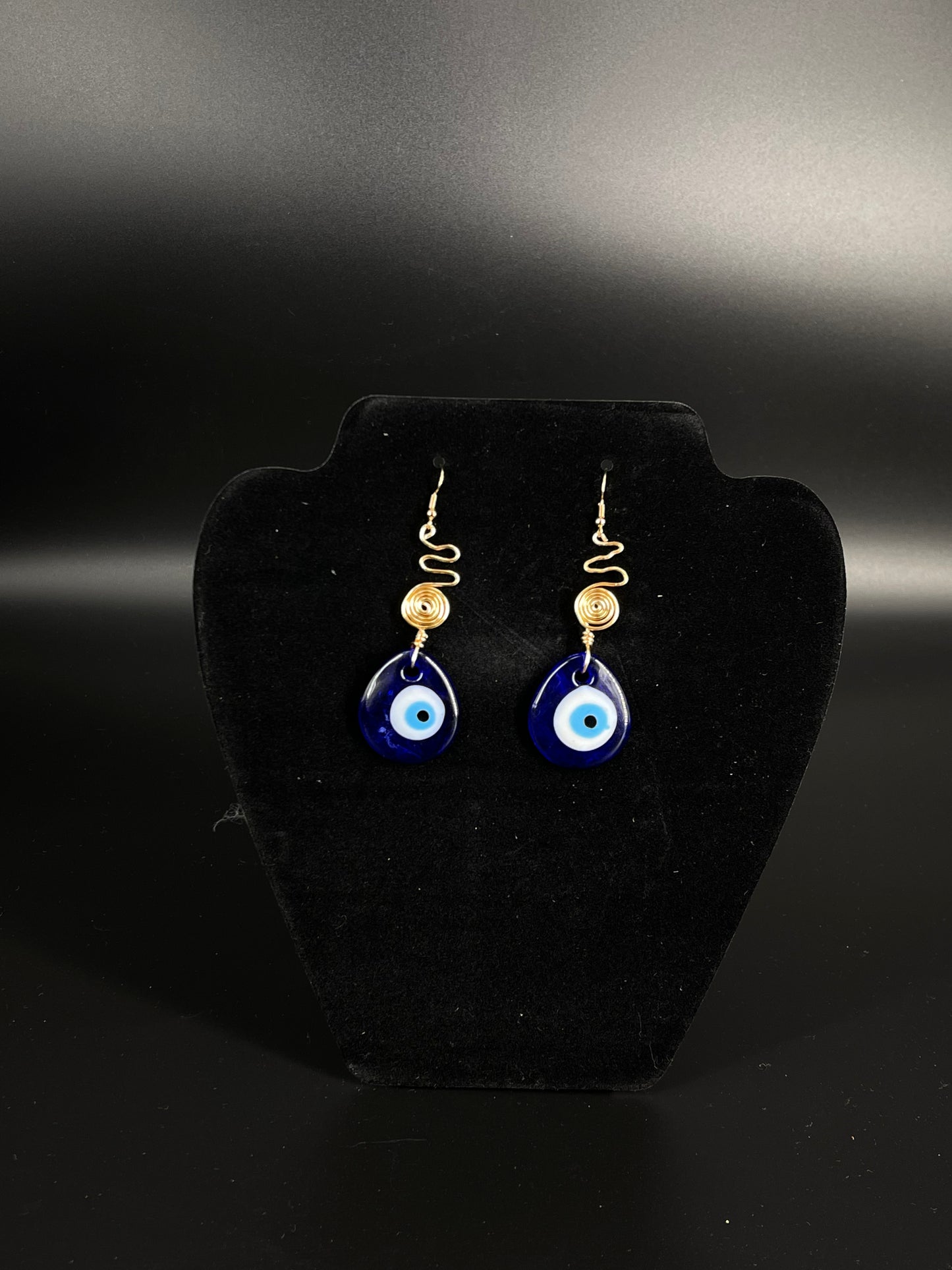 Pendientes de espiral de mal de ojo