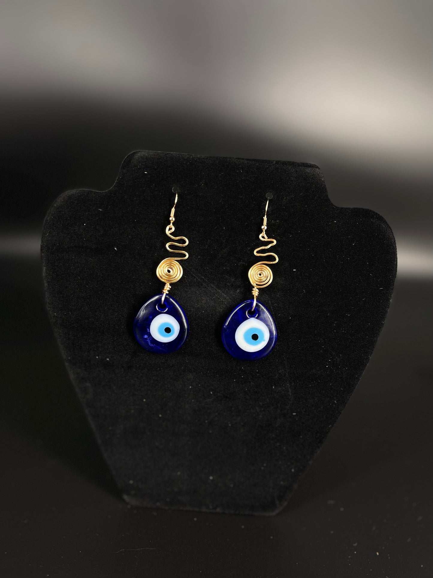 Pendientes de espiral de mal de ojo