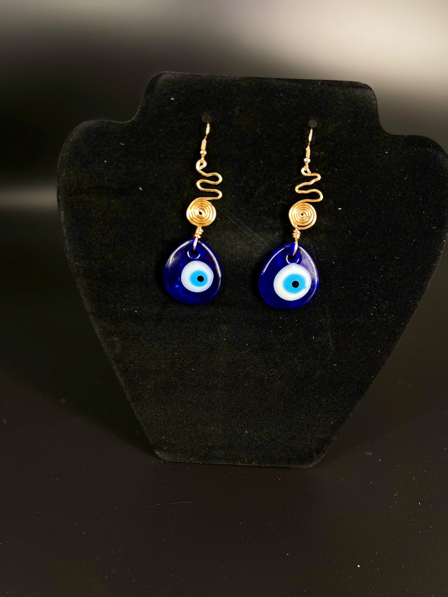 Pendientes de espiral de mal de ojo