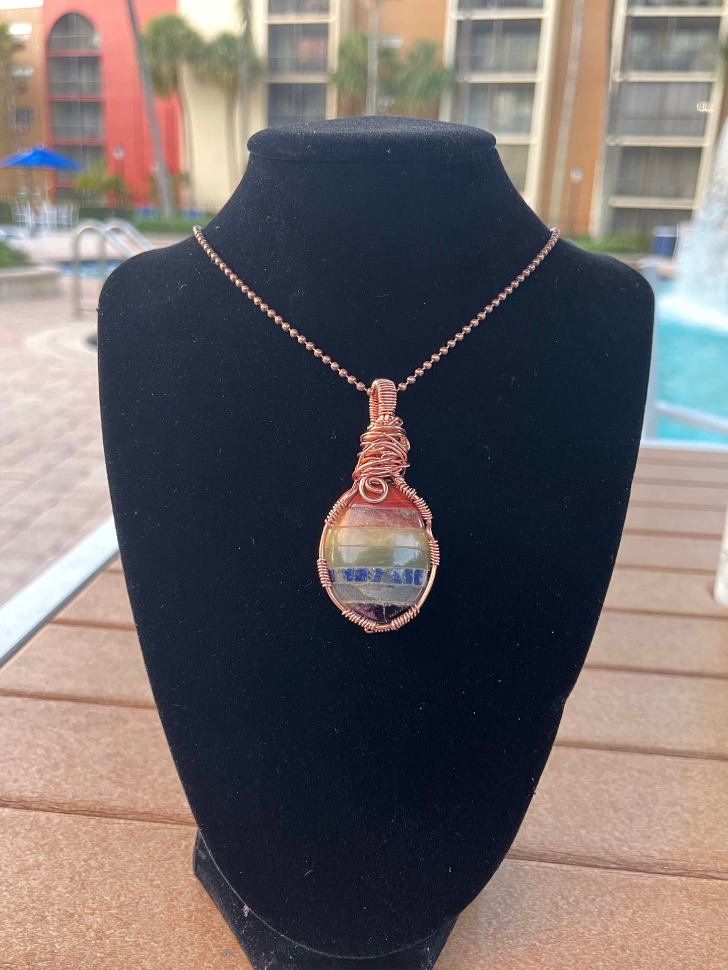 Colgante de los 7 chakras en cobre