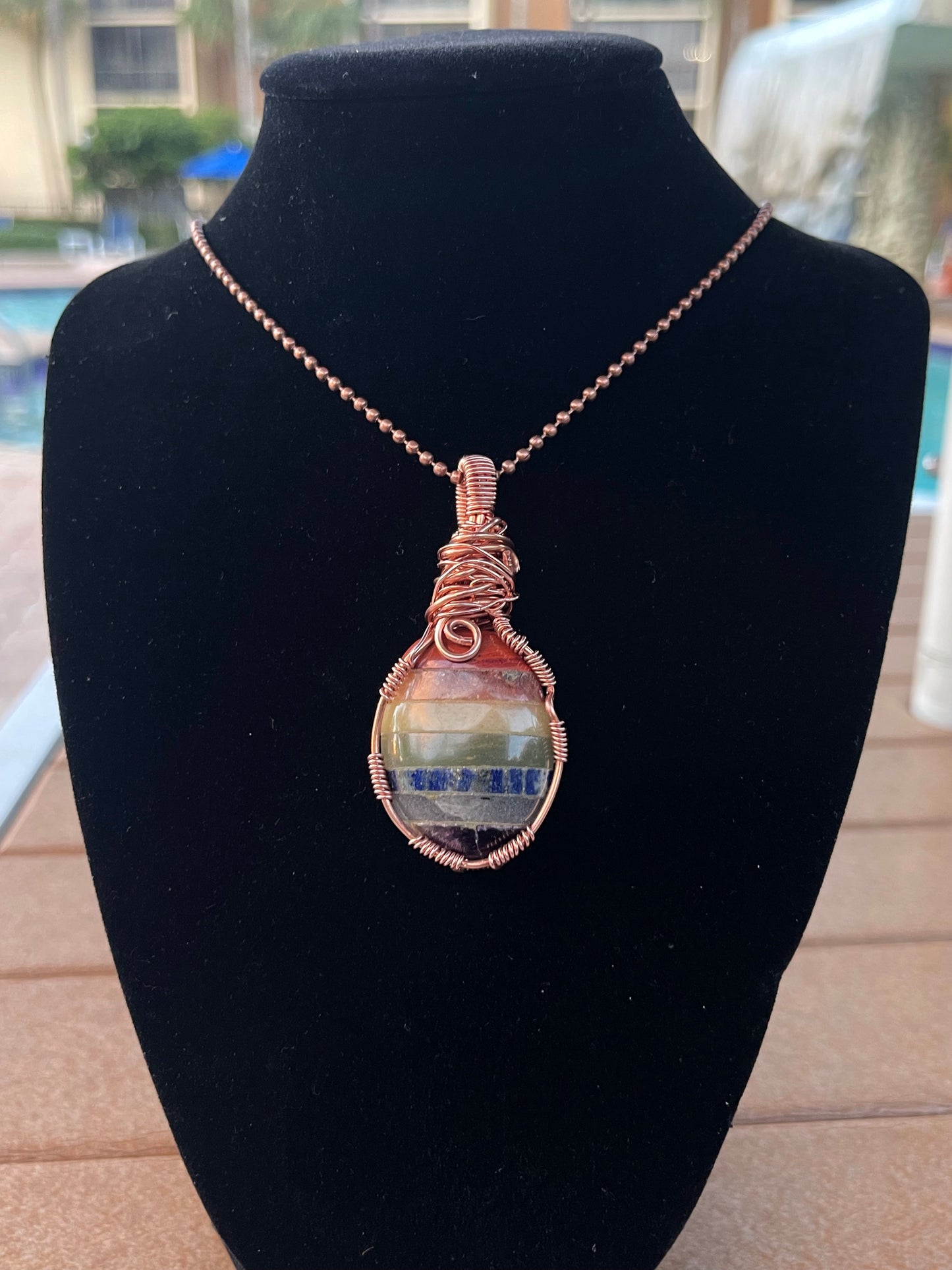 Colgante de los 7 chakras en cobre