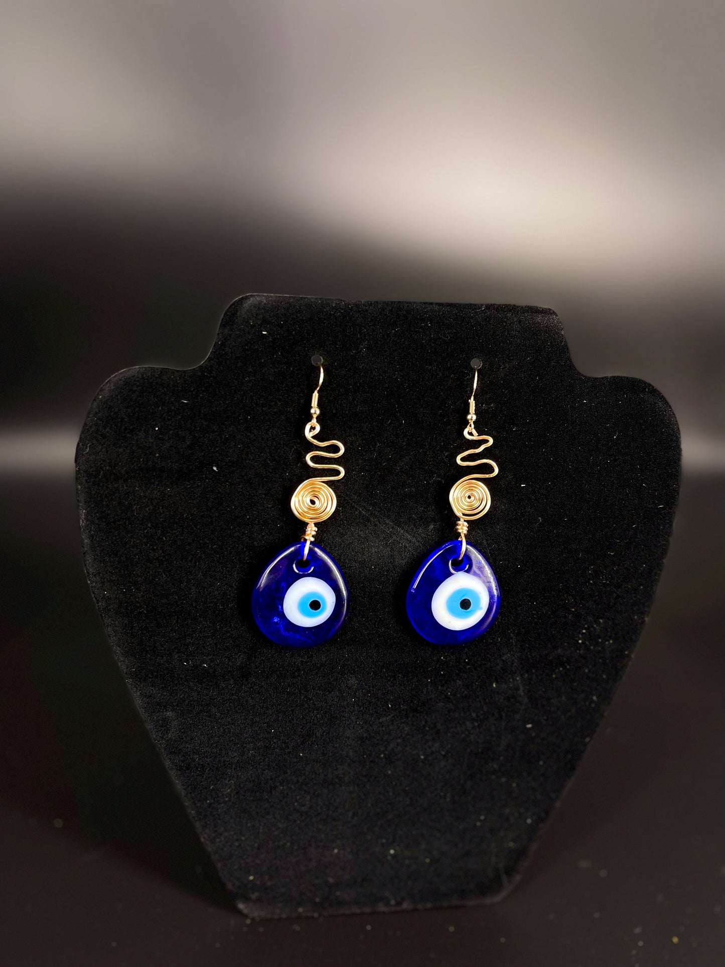 Pendientes de espiral de mal de ojo