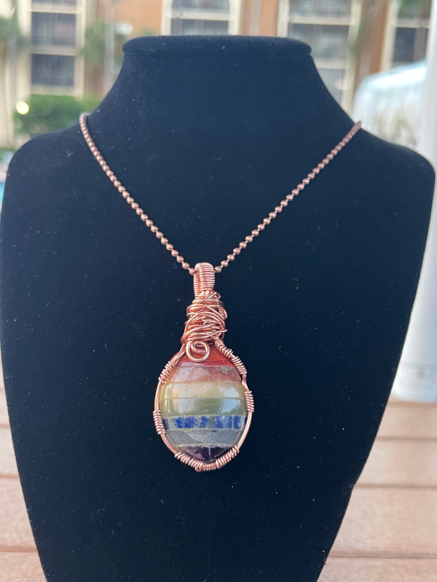 Colgante de los 7 chakras en cobre